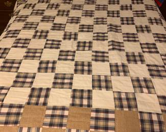 All of the quilts are laid out on a full size bed for these photos 