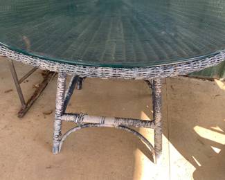 Wicker has a heavy glass top