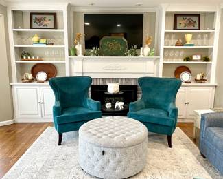 $300 each (2 available); barrel-back, teal velvet arm chairs with nailhead trim; 32x28x40.       SOLD—blue and white tweed storage ottoman.          SOLD; gray and champagne colored, manufactured rug; 9x12.