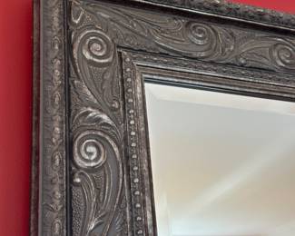 Rectangular mirror with decorative scroll motif