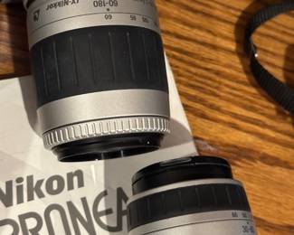 Vintage Nikon Pronea S APS film camera with lenses.
