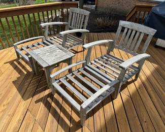 teak lounge chairs and side table