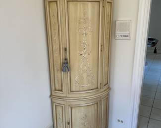 Vintage hand-painted corner cabinet.