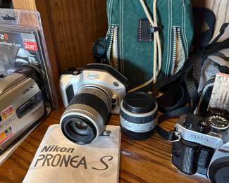 Vintage Nikon Pronea S APS film camera with lenses.