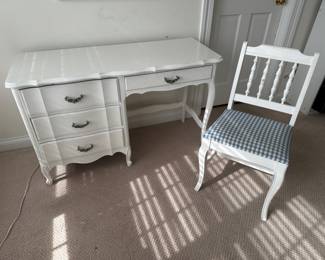 white desk with decorative pulls and matching desk chair