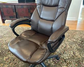 Executive desk chair in brown leather