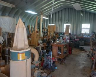 This shop is chocked full of woodworking tools, wood( including nice hardwood)and everything thing else you would need for woodworking