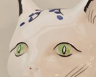 Painted face of cat. 