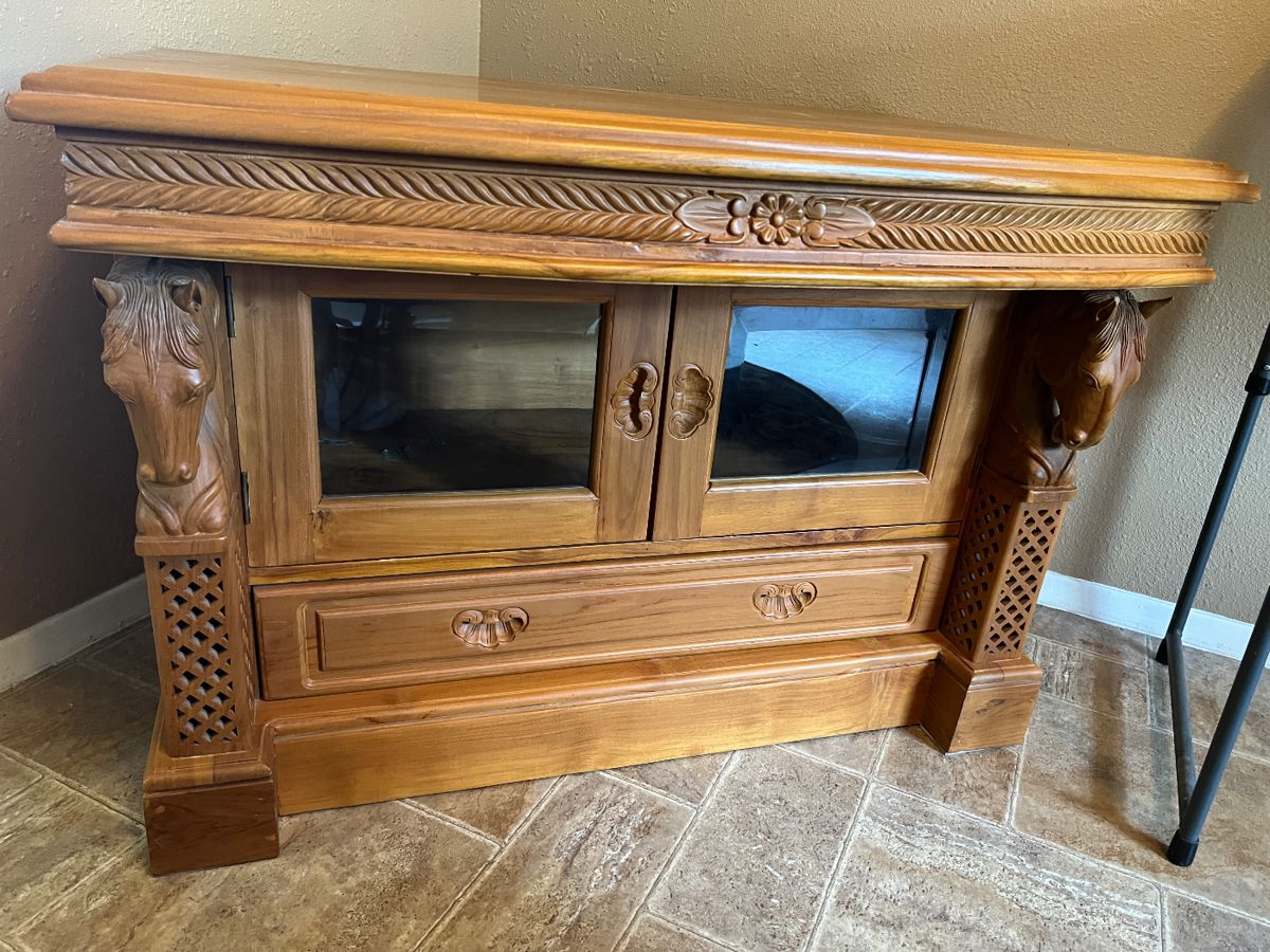 AMAZING INTRICATELY CARVED SOLID WOOD CABINET WITH TWO CARVED HORSE HEADS ON EACH SIDE