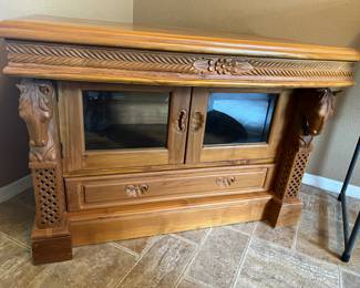 AMAZING INTRICATELY CARVED SOLID WOOD CABINET WITH TWO CARVED HORSE HEADS ON EACH SIDE