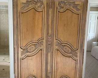 Light wood armoire 92” tall x 58” wide purchased from Mike Bell furniture at the merchandise mart! 