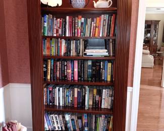 Mahogany shelf with wonderful books.