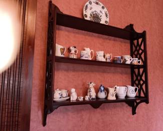 Ornate hanging shelf and creamers
