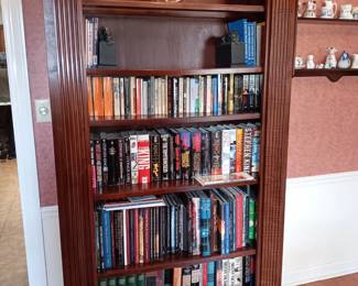 Mahogany shelf full of great books
