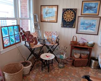 Art work. MSU sign. Tall directors chairs
Airplane posters 