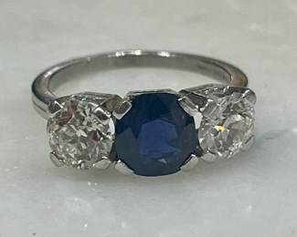 Fabulous platinum sapphire and diamond trinity band.  Center sapphire is over 1 carat and each side stone is 1/2 carat old European cuts…1930s