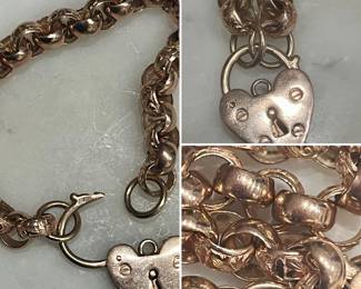 Huge carved rolo link heart bracelet in 14k rose gold…43 grams