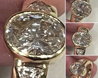 Almost 4 carats of “white lightning” diamonds from Mednikow in 18k
Center stone is 2.4 and side stones are .78 each