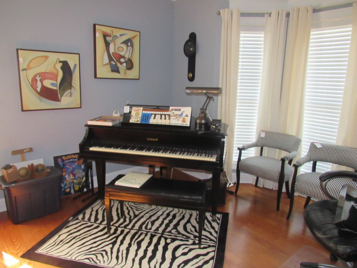 Kimball baby grand, rug, chairs, artwork, Pokemon 