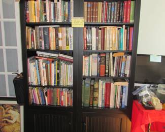2 bookshelves, lots of books, office supplies
