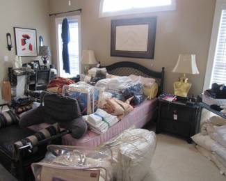 queen wicker bed, nightstands, brass lamps, comforter sets, down pillows, wicker desk, 80's artwork, pressed paper art