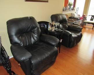 Lazyboy black leather rocker recliners, oval black table, wheelchairs