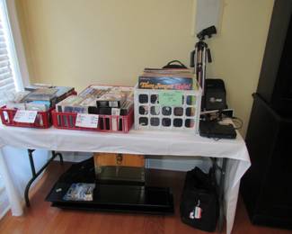 vintage vinyl lps, dvds, vhs, wall shelves, tripod