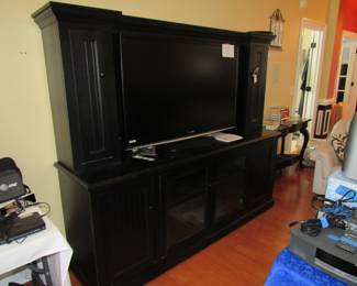 This entertainment center is on wheels!