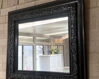 Black framed mirror