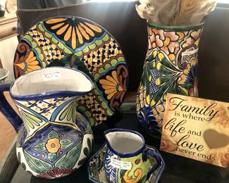 Hand-painted pottery; "Family is where life and love never end."