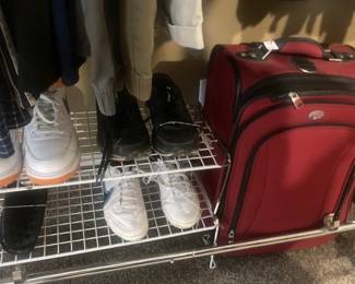 Men's shoes; red luggage