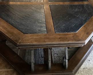 Wood, slate, and metal octagonal coffee table