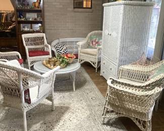 White wicker coffee table, chairs, swing, wardrobe