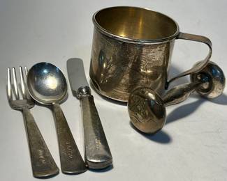 Sterling silver child’s cup, rattle and flatware