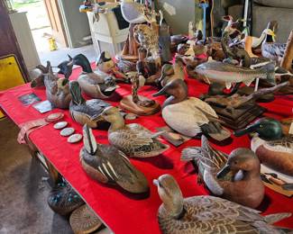 Lots of hand carved really nice ducks and other animals 
