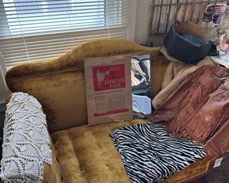 Antique settee with collapsible arms / fringe jacket