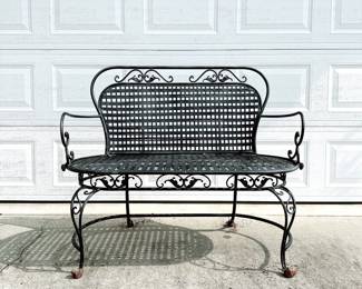 Metal outdoor seating bench