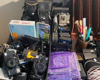 Cameras, binoculars, radios, Garmins