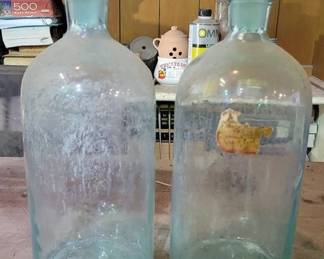 507 - 2 Vintage Glass Apothecary Bottle Jars w/ lids
