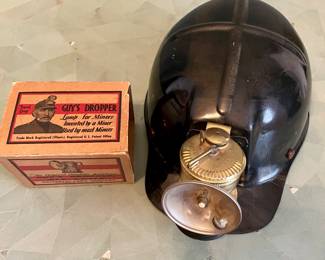 Miner’s helmet and lamp.