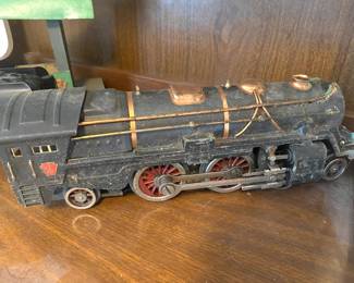 Lionel Standard G gauge Bild-a-Loco train set with eight cars plus locomotive. Includes track, station house, transformer, bridge, two metal conductors, two baggage handlers and more misc. pieces