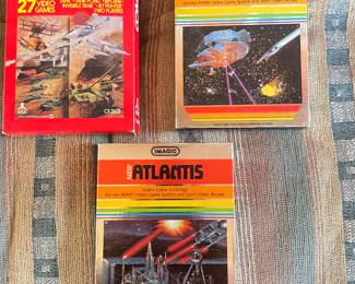 Combat Video game program,  $10.  Imagic Star Voyager,  $8.  Imagic Atlantis,  $8