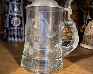Vintage glass beer stein with decorative etching $15