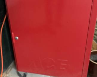 Red metal cabinet on casters,  $75