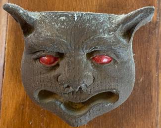Devil red eye wall plaque,  3" x 4",  $7