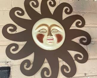 Brown sun with face, metal, 16" diameter,  $20