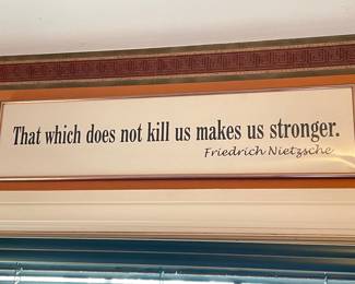 "That which does not kill us makes us stronger" sign,  30"W x 9"H,  $15