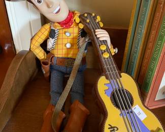Woody doll and guitar,  $18