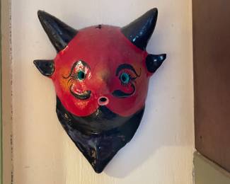 Red black, blue eye devil plaque, $10