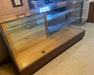 Glass display case, 70"W x 38"H x 20"D,  $125